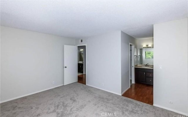 1549 W 146th St Unit 9, Gardena, CA 90247 - unfurnished bedroom with carpet flooring and ensuite bathroom