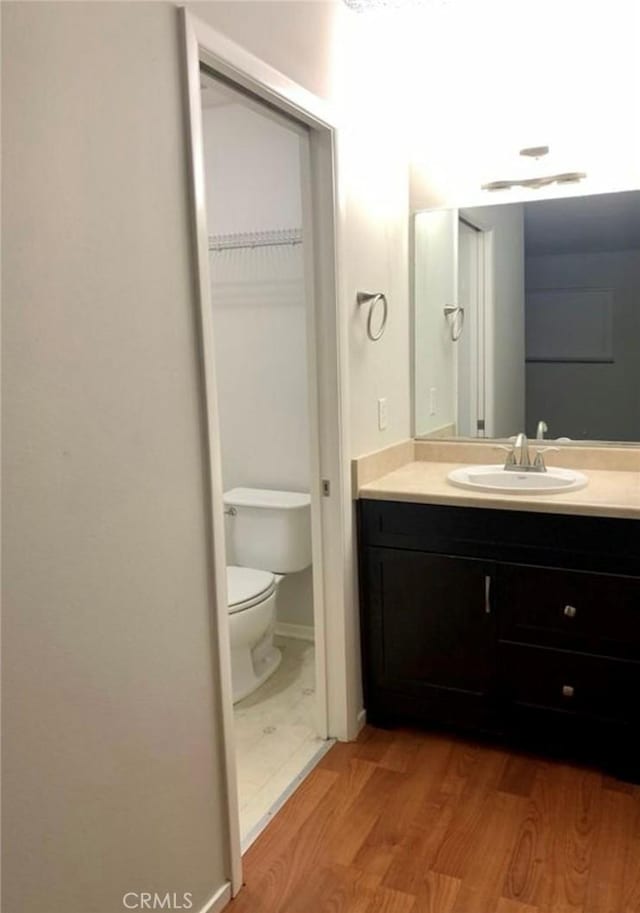 1549 W 146th St Unit 9, Gardena, CA 90247 - bathroom featuring vanity and wood finished floors