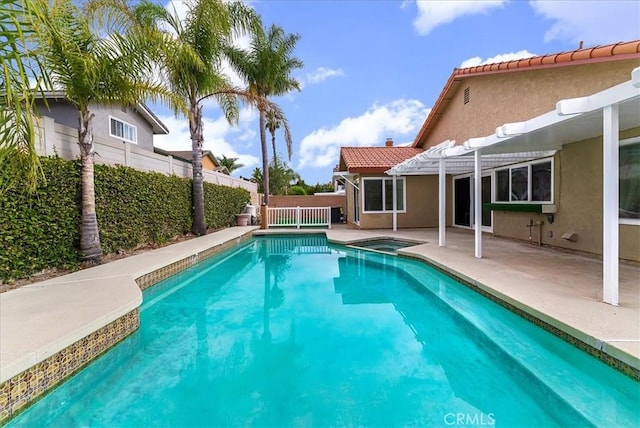 21211 Poston Ln, Huntington Beach, CA 92646 - view of swimming pool featuring a fenced backyard, a patio area, a pergola, and a pool with connected hot tub