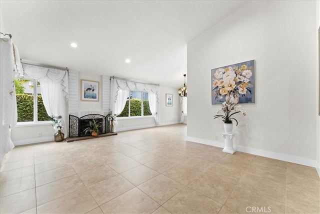 21211 Poston Ln, Huntington Beach, CA 92646 - unfurnished living room with light tile patterned floors, recessed lighting, and a fireplace