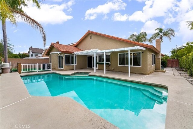 21211 Poston Ln, Huntington Beach, CA 92646 - view of pool featuring a pergola, an in-ground hot tub, a fenced backyard, and a patio