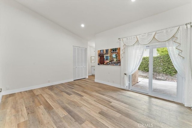 21211 Poston Ln, Huntington Beach, CA 92646 - unfurnished room featuring light wood-style flooring, recessed lighting, and high vaulted ceiling