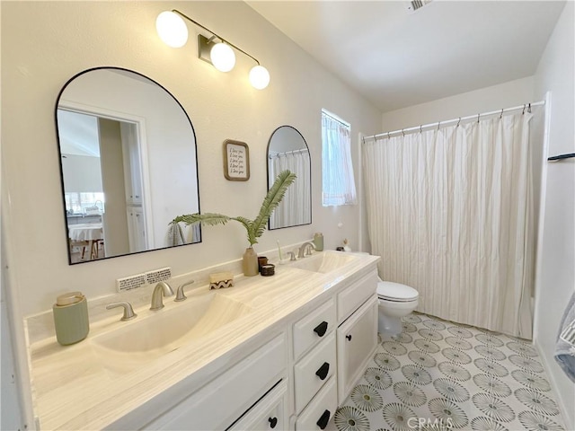 8655 Moody St, Cypress, CA 90630 - bathroom featuring double vanity and a shower with shower curtain
