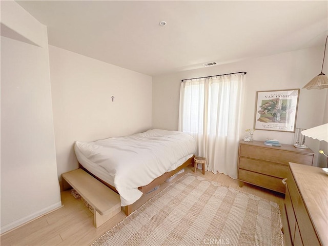 8655 Moody St, Cypress, CA 90630 - bedroom with light wood-style floors