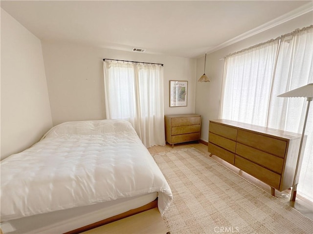 8655 Moody St, Cypress, CA 90630 - bedroom featuring multiple windows