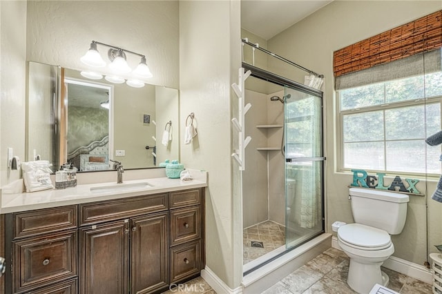 6626 W Alluvial Ave, Fresno, CA 93722 - bathroom featuring a shower stall and vanity