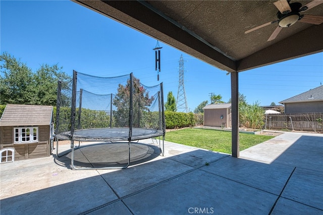 6626 W Alluvial Ave, Fresno, CA 93722 - view of patio featuring a shed, a trampoline, and ceiling fan