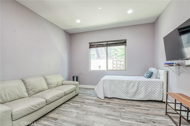 6626 W Alluvial Ave, Fresno, CA 93722 - bedroom featuring wood finished floors and recessed lighting