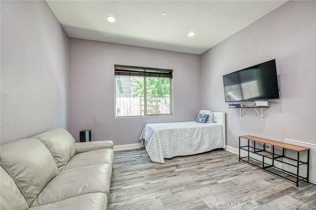 6626 W Alluvial Ave, Fresno, CA 93722 - bedroom featuring wood finished floors and recessed lighting