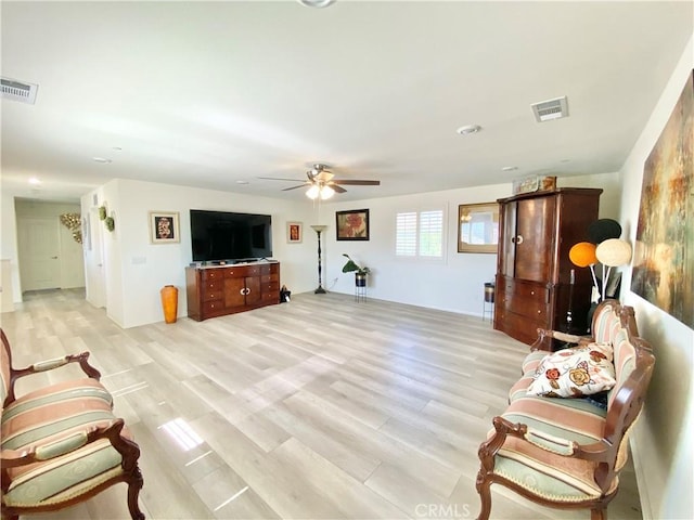 1011 Balsam St, Calimesa, CA 92320 - living room with light wood-style floors and ceiling fan