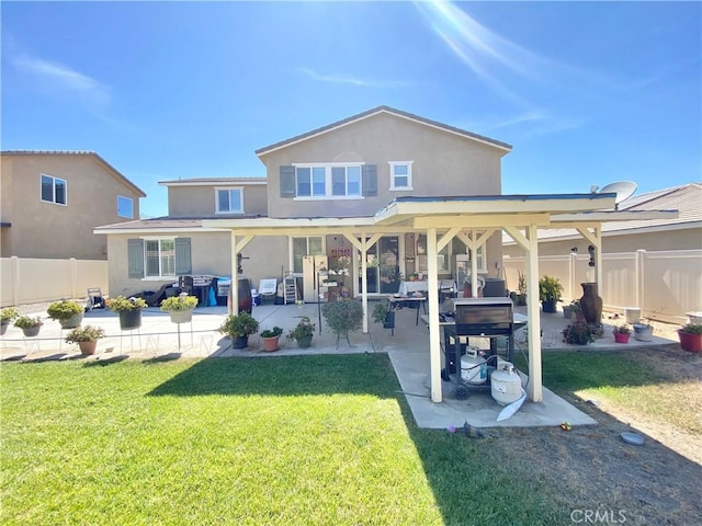 1011 Balsam St, Calimesa, CA 92320 - back of property with a patio area, stucco siding, and a fenced backyard