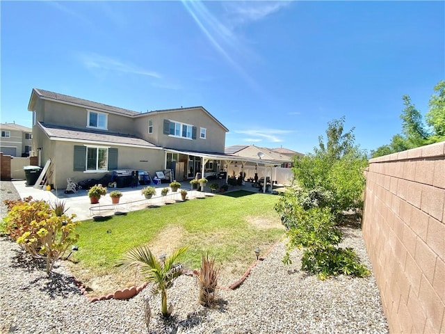 1011 Balsam St, Calimesa, CA 92320 - rear view of property featuring stucco siding, a fenced backyard, and a patio area