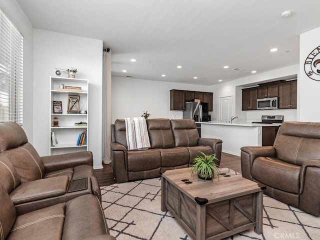 29425 Bovenzi Way, Winchester, CA 92596 - living area with recessed lighting and light wood-style flooring