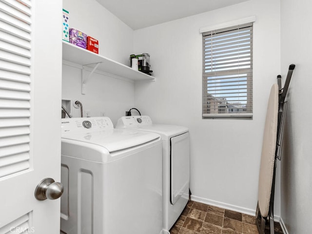 29425 Bovenzi Way, Winchester, CA 92596 - laundry room featuring washing machine and dryer and stone finish flooring