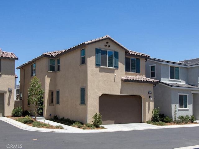 29425 Bovenzi Way, Winchester, CA 92596 - mediterranean / spanish house featuring a garage, stucco siding, and a tile roof
