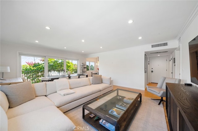 3407 Huxley St Unit 31, Los Angeles, CA 90027 - living room with healthy amount of natural light, ornamental molding, recessed lighting, and light wood finished floors