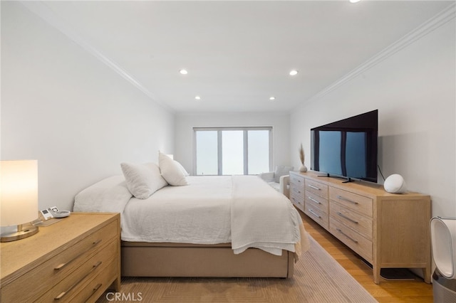 3407 Huxley St Unit 31, Los Angeles, CA 90027 - bedroom with ornamental molding, light wood-style flooring, and recessed lighting