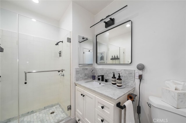 3407 Huxley St Unit 31, Los Angeles, CA 90027 - full bathroom featuring a stall shower, vanity, and tasteful backsplash