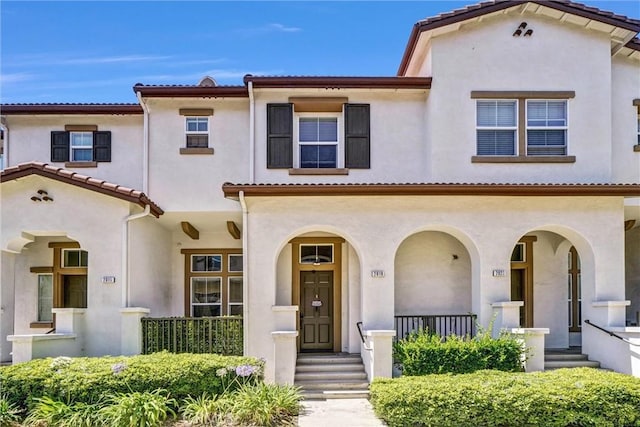 2019 Arnold Way, Fullerton, CA 92833 - mediterranean / spanish-style house featuring covered porch and stucco siding