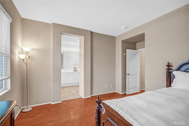 2019 Arnold Way, Fullerton, CA 92833 - bedroom featuring light wood-style flooring and ensuite bath
