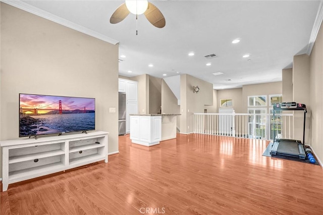 2019 Arnold Way, Fullerton, CA 92833 - unfurnished living room featuring ornamental molding, a ceiling fan, light wood-type flooring, and recessed lighting