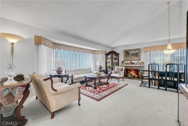 1135 Hampton Ct, San Dimas, CA 91773 - carpeted living area featuring a textured ceiling, plenty of natural light, a chandelier, and lofted ceiling
