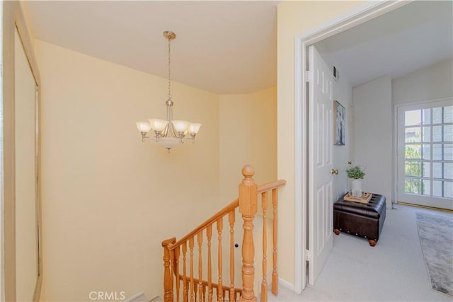 15034 Ocaso Ave, La Mirada, CA 90638 - corridor featuring a chandelier, an upstairs landing, and carpet