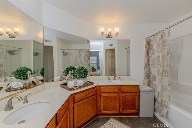 15034 Ocaso Ave, La Mirada, CA 90638 - full bathroom with double vanity, shower / bath combo with shower curtain, and tile patterned floors