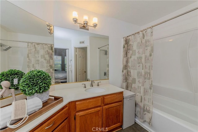 15034 Ocaso Ave, La Mirada, CA 90638 - bathroom featuring shower / tub combo and vanity