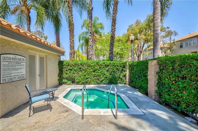 15034 Ocaso Ave, La Mirada, CA 90638 - view of swimming pool with a community hot tub and a patio area