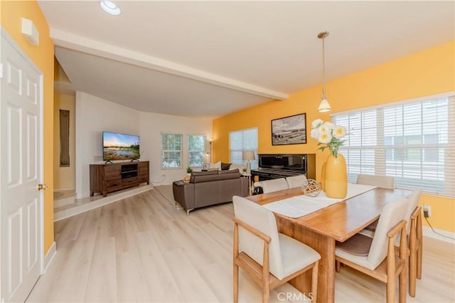 15034 Ocaso Ave, La Mirada, CA 90638 - dining space featuring beamed ceiling and light wood-style floors