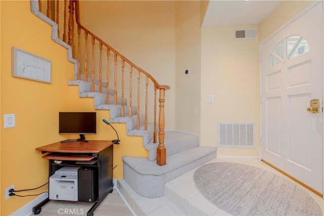 15034 Ocaso Ave, La Mirada, CA 90638 - entrance foyer featuring stairs and baseboards