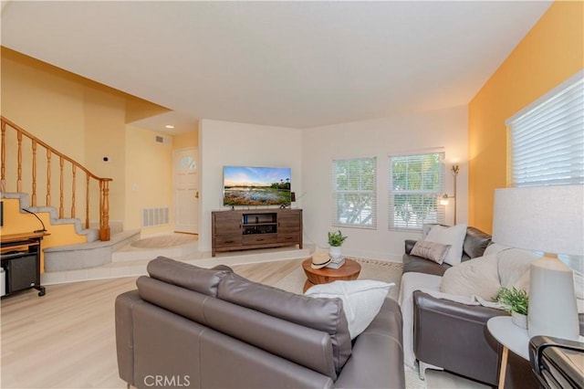 15034 Ocaso Ave, La Mirada, CA 90638 - living area with stairway and light wood finished floors