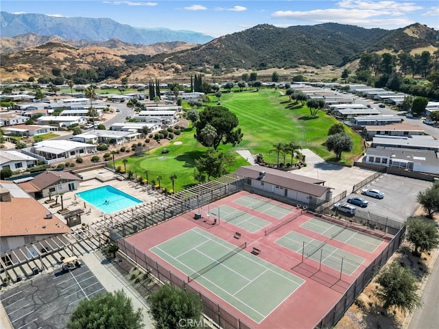 41050 Mohawk Cir, Cherry Valley, CA 92223 - drone / aerial view of a mountain backdrop and a golf course