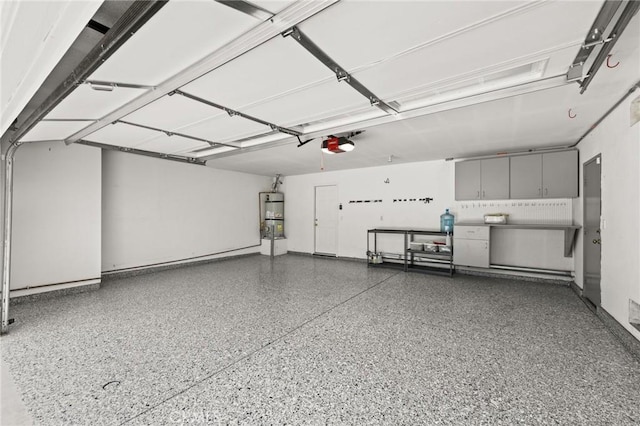 1167 Belridge Pl, Corona, CA 92881 - garage featuring water heater and a garage door opener
