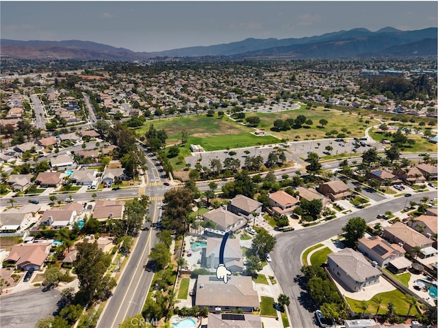 1167 Belridge Pl, Corona, CA 92881 - aerial overview of property's location with a mountain backdrop and nearby suburban area