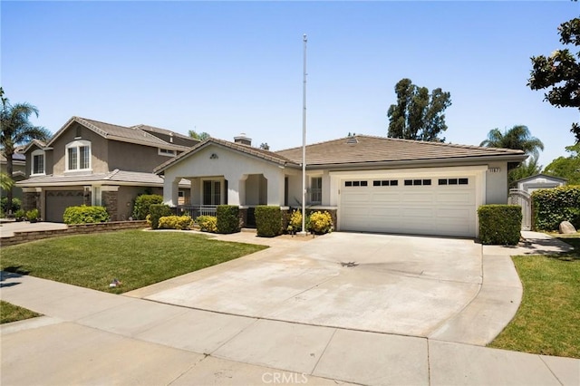 1167 Belridge Pl, Corona, CA 92881 - view of front facade with concrete driveway, a front lawn, stucco siding, and a garage
