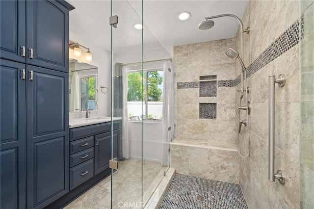 1167 Belridge Pl, Corona, CA 92881 - full bathroom featuring tiled shower, vanity, marble finish floors, and a textured ceiling
