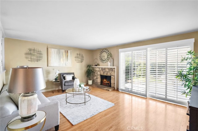 6182 Anthony Ave, Garden Grove, CA 92845 - living area featuring a fireplace and wood finished floors