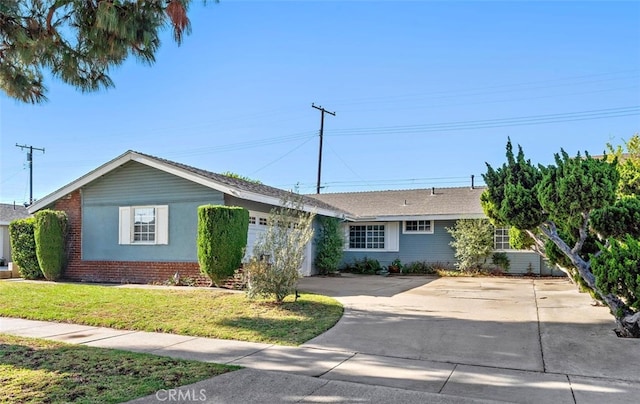 6182 Anthony Ave, Garden Grove, CA 92845 - ranch-style home with concrete driveway, a garage, a front yard, and brick siding