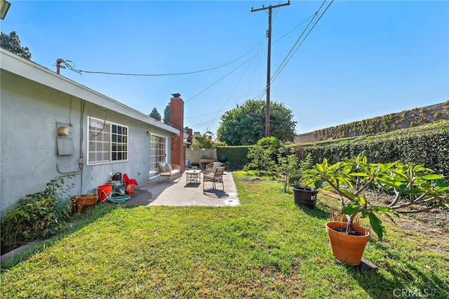 6182 Anthony Ave, Garden Grove, CA 92845 - fenced backyard with a patio area