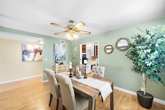6182 Anthony Ave, Garden Grove, CA 92845 - dining space featuring light wood finished floors and a ceiling fan