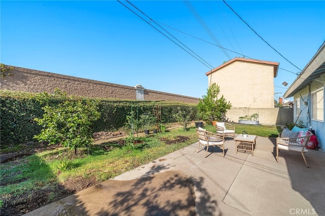 6182 Anthony Ave, Garden Grove, CA 92845 - fenced backyard with an outdoor living space and a patio area