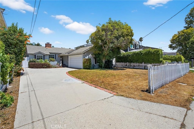 15747 Addison St, Encino, CA 91436 - view of front facade featuring an attached garage, driveway, and solar panels