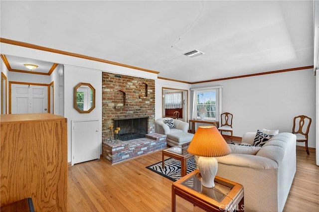 15747 Addison St, Encino, CA 91436 - living area featuring crown molding, light wood-style floors, and a brick fireplace