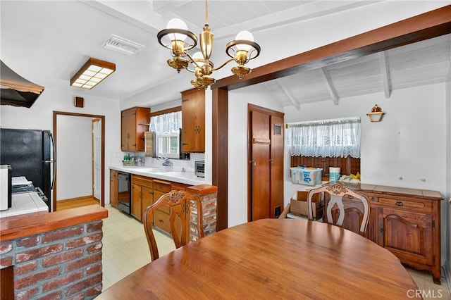 15747 Addison St, Encino, CA 91436 - dining area with a chandelier