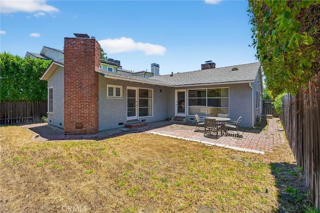 15747 Addison St, Encino, CA 91436 - back of house featuring stucco siding, a fenced backyard, a patio, and a chimney