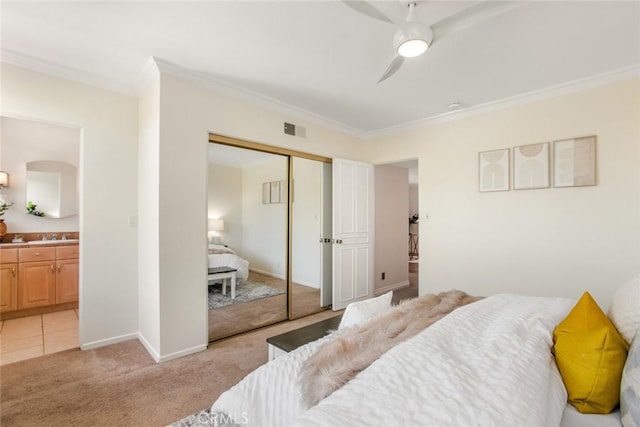 4320 W Kling St Unit 27, Burbank, CA 91505 - bedroom featuring crown molding, light colored carpet, a closet, a ceiling fan, and ensuite bath