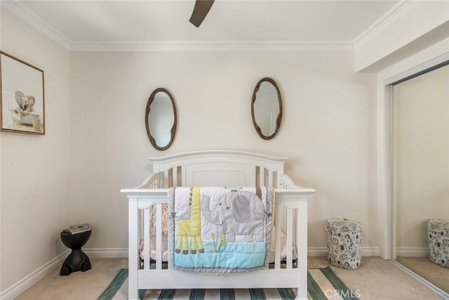 4320 W Kling St Unit 27, Burbank, CA 91505 - bedroom featuring carpet floors, ornamental molding, a ceiling fan, a crib, and a closet