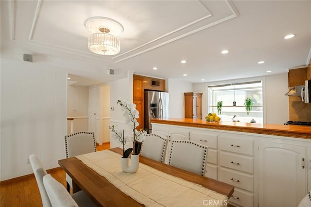 4320 W Kling St Unit 27, Burbank, CA 91505 - dining space featuring light wood-style floors, recessed lighting, and a chandelier